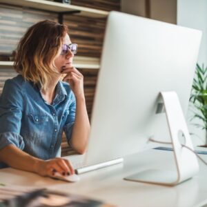 img of a woman working on a computer